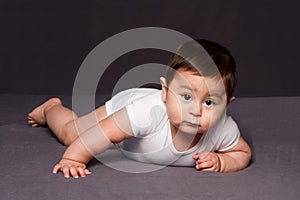 Cute happy baby laying