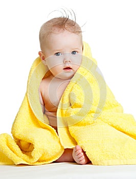 Cute happy blue-eyed baby in colorful towel