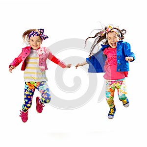 Cute happy children jumping on white background