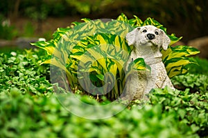 Cute Happy Dog Lawn Ornament in Lush Green Garden