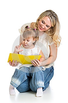 Cute happy kid reading a book