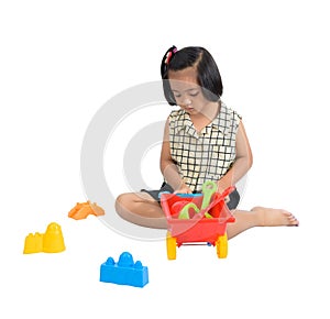 Cute Happy little child playing beach toys isolate on white