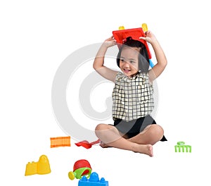 Cute Happy little child playing beach toys isolate on white