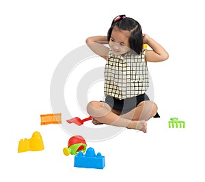 Cute Happy little child playing beach toys isolate on white