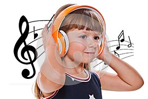 cute happy little girl listening music with headphones