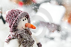 Cute Happy Smiling Snowman Wearing Winter Scarf and Hat