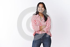 Cute and happy young female coworker smiling broadly starting own business encouraged for success grinning and laughing