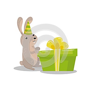 Cute hare in party hat with big green gift box cartoon vector Illustration