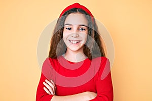 Cute hispanic child girl wearing casual clothes and diadem happy face smiling with crossed arms looking at the camera