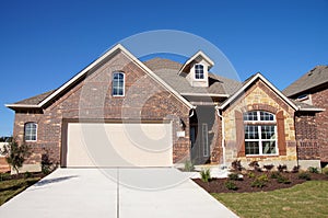 Cute house brick stone blue sky