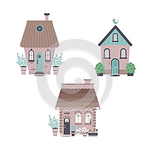 Cute houses with lights, bushes, flowers in pots. Sweet home or welcome home concept. Vector flat illustrations set.