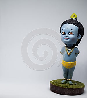 Cute idol of Hindu God Lord Krishna
