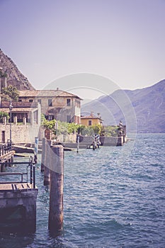 Cute idyllic Italian village and lake captured from the water. Limone at lago di Garda