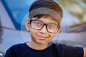 Cute Indian child wear eyeglass