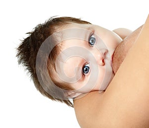 Cute infant breasting face, young mother breast feeding her baby