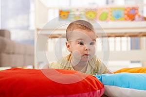 Cute infant on playmat photo