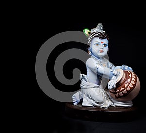 Cute and innocent idol of Hindu God Lord Krishna