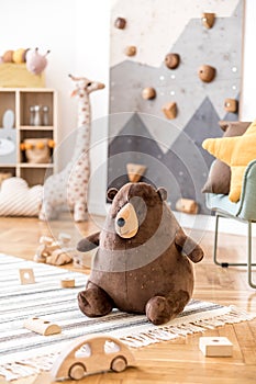 Cute interior of kid room with baby accessories and toys.