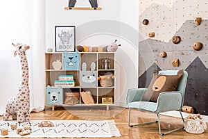 Cute interior of kid room with baby accessories and toys.