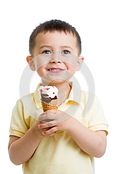 Cute kid boy eating ice-cream isolated