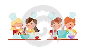 Cute kid chef characters set. Adorable cheerful children cooking in the kitchen cartoon vector illustration