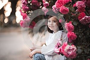 Cute kid girl with flowers