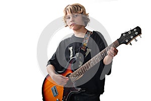 Cute kid with guitar upclose