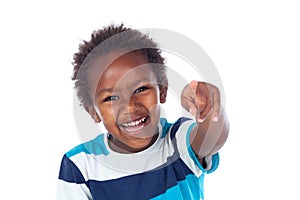 Cute kid pointing with his finger at camera