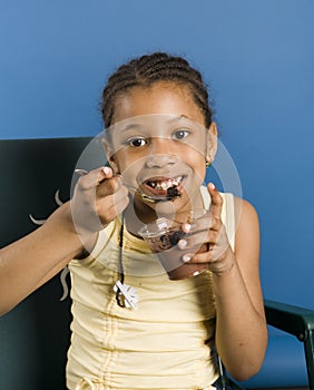 Cute kid with pudding