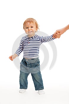 Cute kid pulling parent's hand