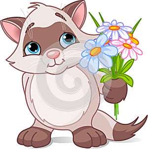 Cute kitten with flowers