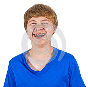 Cute laughing happy boy isolated on white