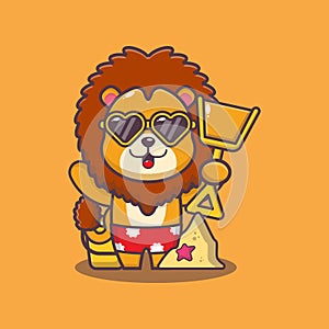 Cute lion playing sand beach in summer time
