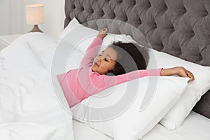 Cute little African-American girl sleeping