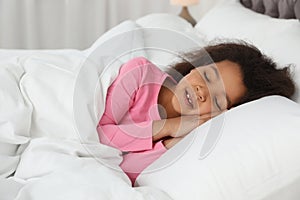 Cute little African-American girl sleeping