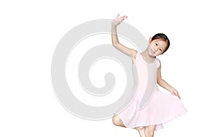 Cute little Asian child girl ballerina in pink tutu skirt isolated on white background. Kid practise her dance. Children ballet