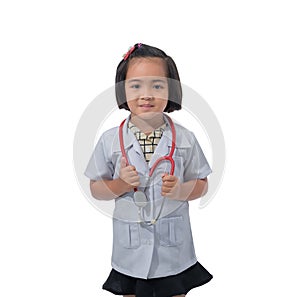 Cute Little asian girl doctor smiling and holding stethoscope while wearing Doctor`s uniform