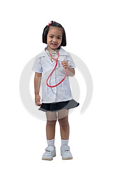 Cute Little asian girl doctor smiling and holding stethoscope while wearing Doctor`s uniform