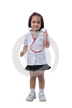 Cute Little asian girl doctor smiling and holding stethoscope while wearing Doctor`s uniform