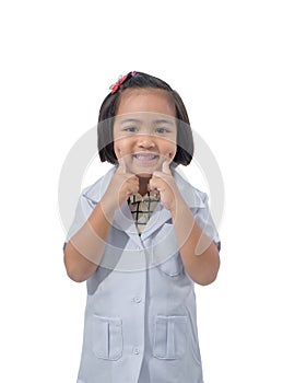 Cute Little asian girl doctor smiling while wearing Doctor`s uniform