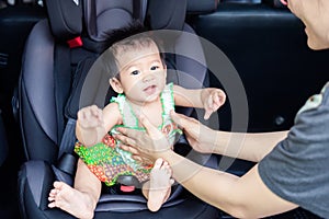Cute little baby child sitting in car seat. Child transportation safety