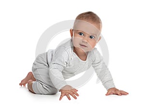 Cute little baby crawling on white background