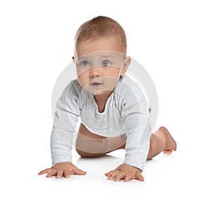 Cute little baby crawling on white background