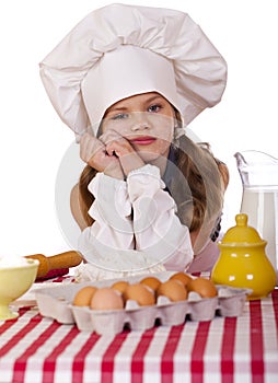 Cute little baby dressed as a cook