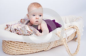 Cute little baby fashion lies in the basket