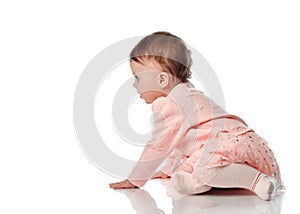 Cute little baby girl creeping on white background