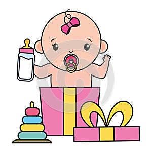 cute little baby girl with milk bottle in gift box