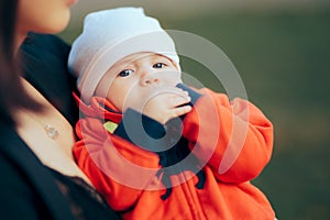 Cute Little Baby Hold by Mom in Loving Embrace