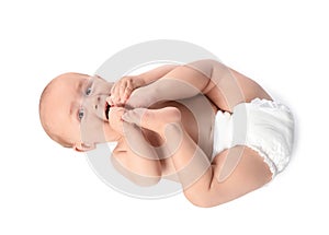 Cute little baby lying on white background, top photo