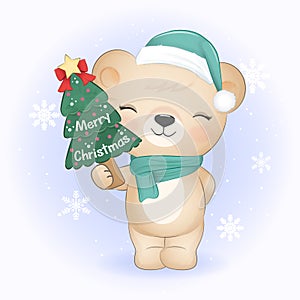 Cute little bear holding Christmas tree. Christmas season